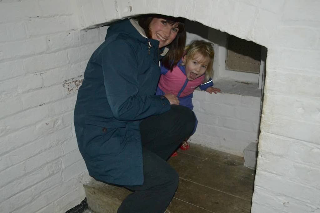 Tin Box Traveller and Tot play hide and seek in the powder room at Dartmouth Castle