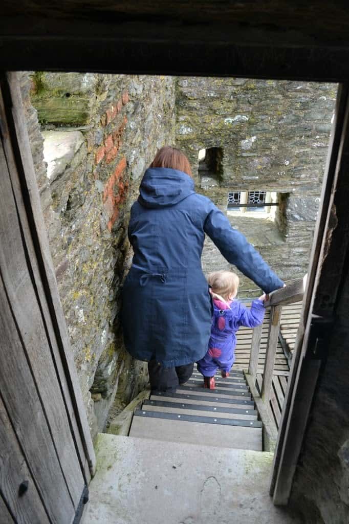 Tin Box Traveller takes Tin Box Tot down steep steps at Dartmouth Castle