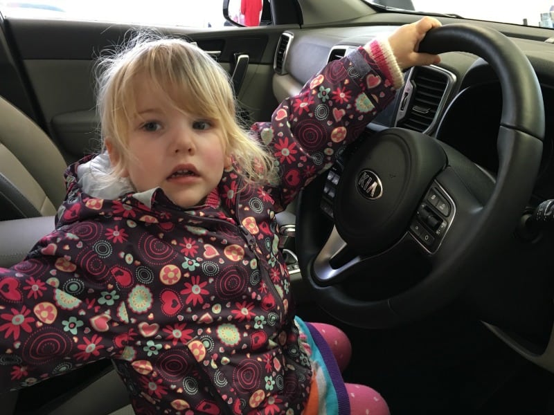 Tin Box Tot in car