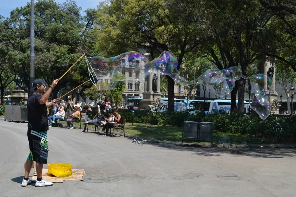 Bubbles in Placa Catalonia - Barcelona with a buggy