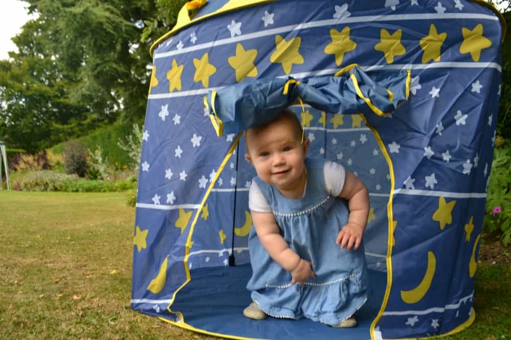 Tin Box Baby in play tent at Midsummer Dreams Festival at Darlington Hall