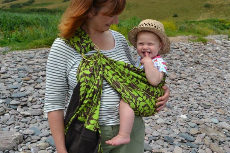 Close up of Tin Box Baby in Rockin' Baby sling