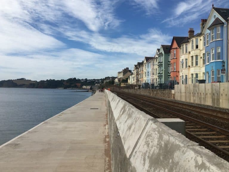 Dawlish sea front houses and train line - Holidaying in South Devon, a caravan staycation
