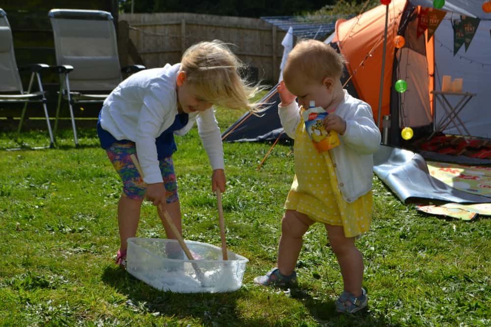Tin Box Tot making bubbles - Big Little Tent Festival