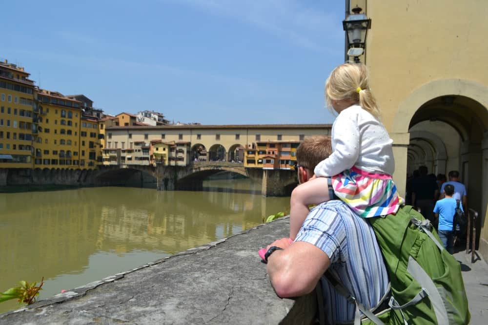 Tin Box Tot and Mr Tin Box looking at Ponte Vecchio - Florence with toddlers what to see in 4 hours