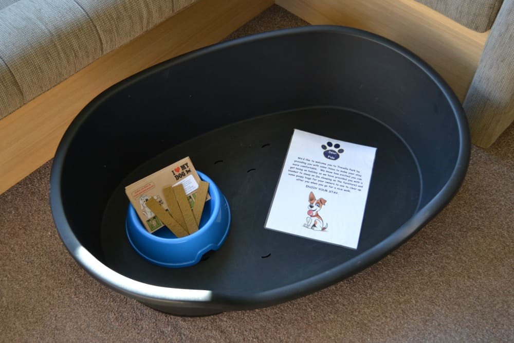 Dog basket and treats offered to pet guests at Trevella Holiday Park
