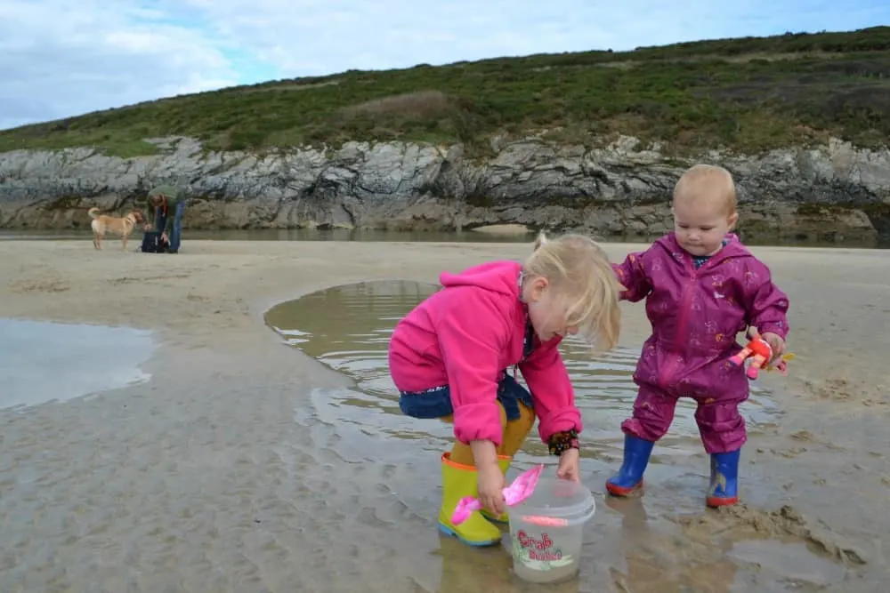 Tin Box girls playing on Crantock Beach near Trevella Holiday Park, Cornwall