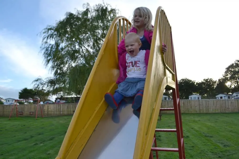 Tin Box girls at the top of the slide at Trevella Holiday Park, Cornwall