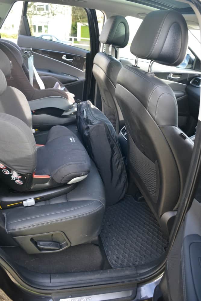 Stroller behind seats in car - Baby Jogger City Tour review - a great travel stroller