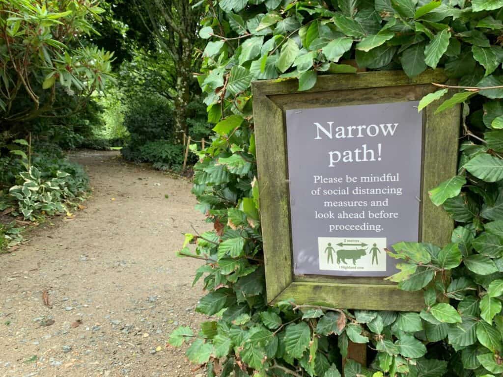 Social distancing sign at Lost Gardens of Heligan