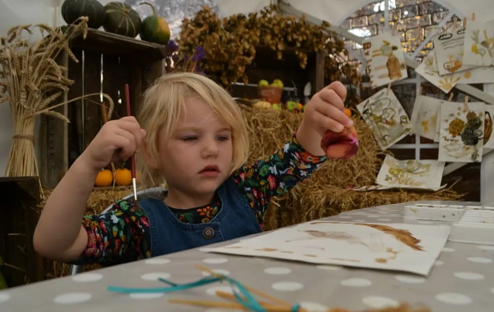 Tin Box Tot painting with natural ingredients at The Lost Gardens of Heligan - Heligan with children