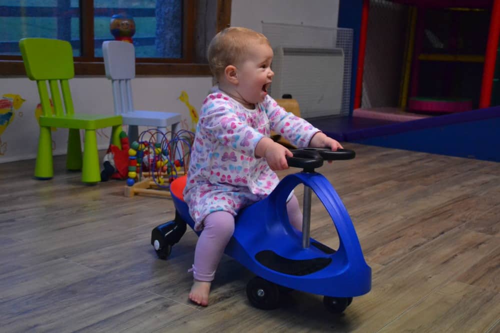 Tin Box Tot on ride on toy - A perfect winter holiday with children at Bosinver, Cornwall