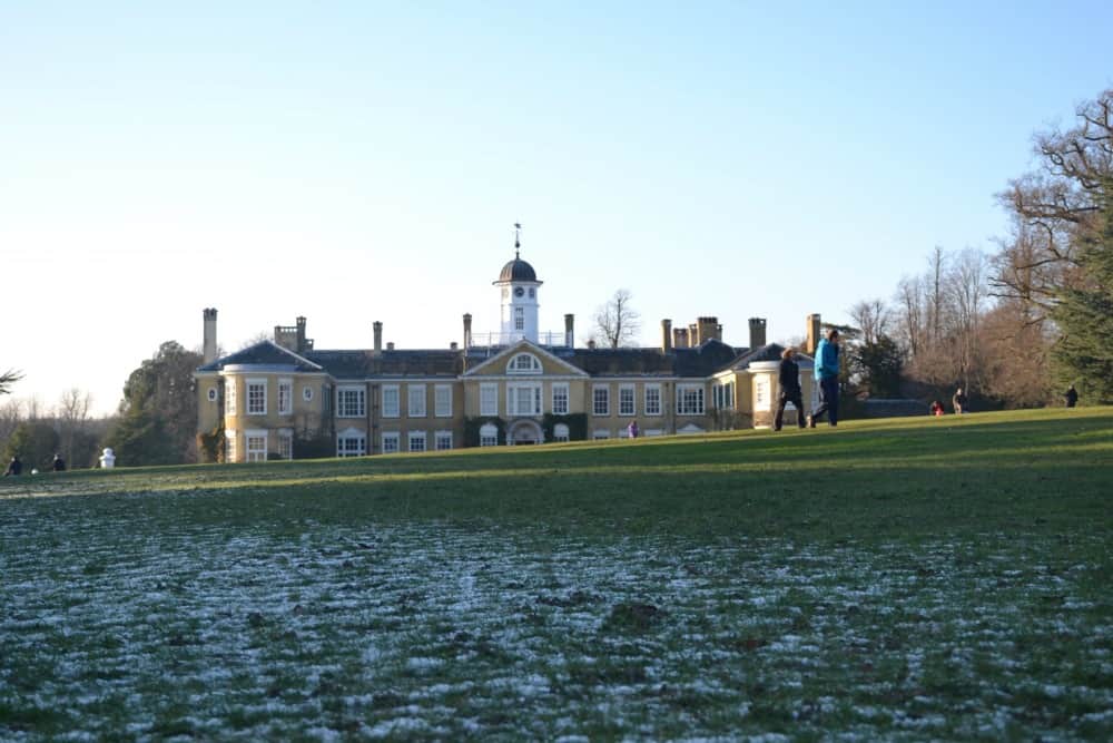 House viewed across frozen lawns - Unseen Spaces at Polesden Lacey National Trust