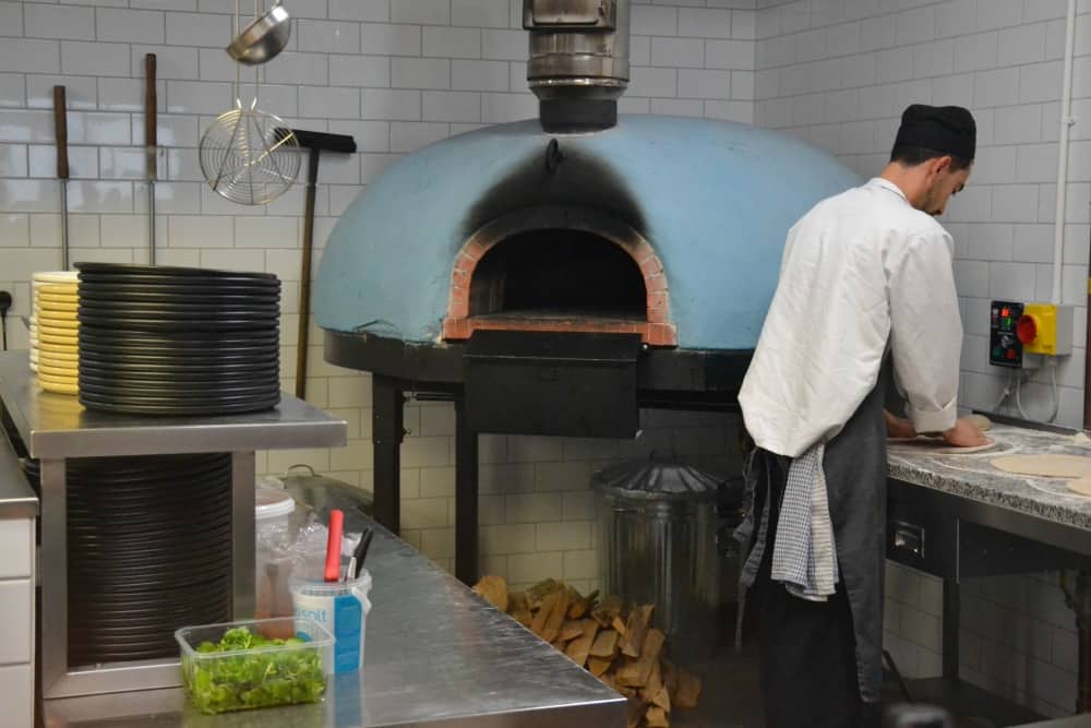 Wood burning pizza oven in ODE&Co at Coast View Holiday Park