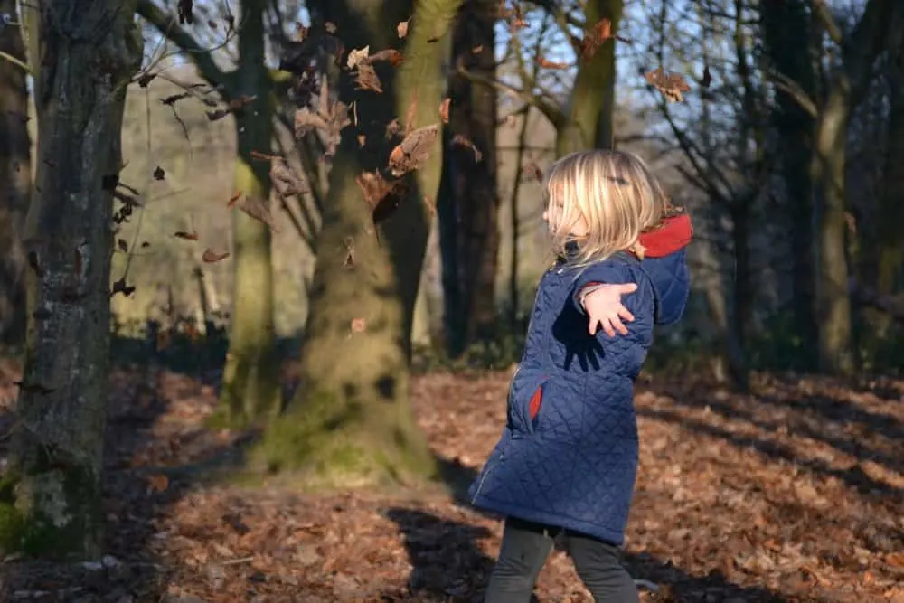 Tin Box Tot throwing leaves - Unseen Spaces at Polesden Lacey National Trust
