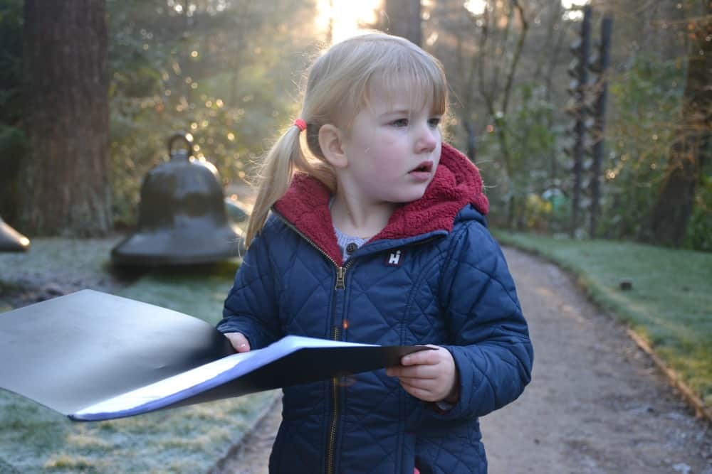 Tin Box Tot holding Sculpture Park guidebook - A visit to the world's largest all year sculpture park