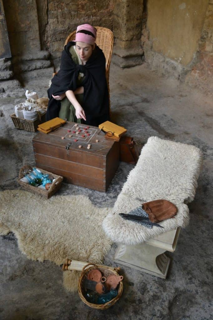 Roman costumed character in the Great Bath - visiting he Roman Baths with toddlers