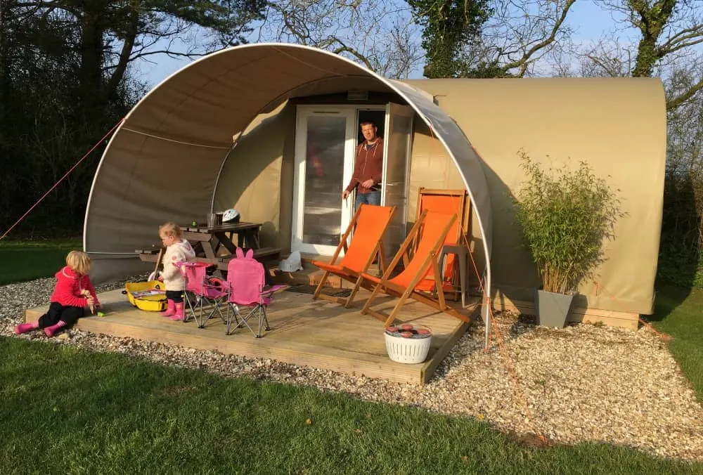 Woman senior and young relaxing at glamping camping tent outdoor