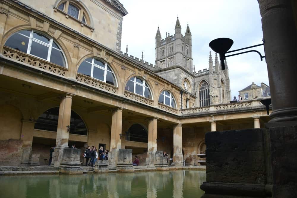 The Great Bath - Tin Box family looking at Grand Bath - Visiting the Roman Baths with toddlers