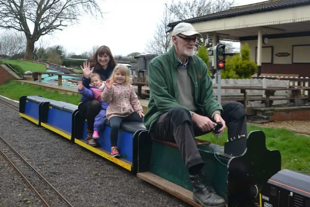 Tin Box family on model train - Avon Valley Adventure & Wildlife Park