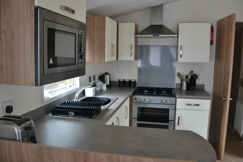 Kitchen in a platinum lodge - Woodland lodge resort for families: St Ives Holiday Village review