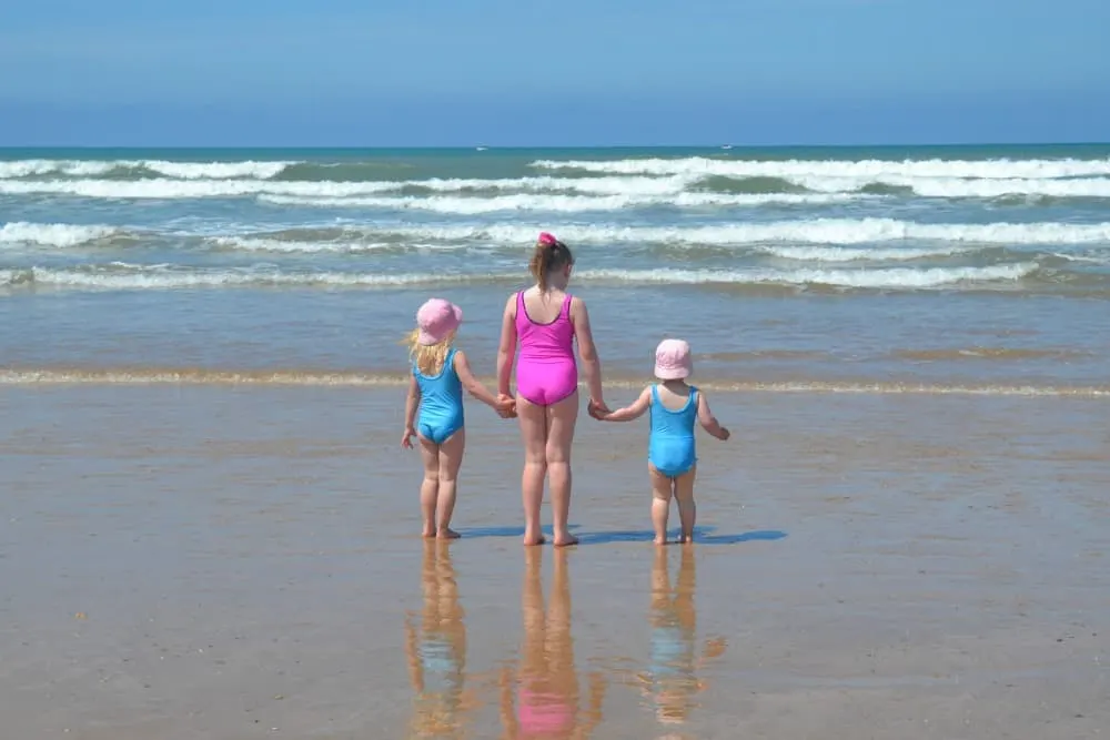 Kids on beach at Brem sur Mer in France