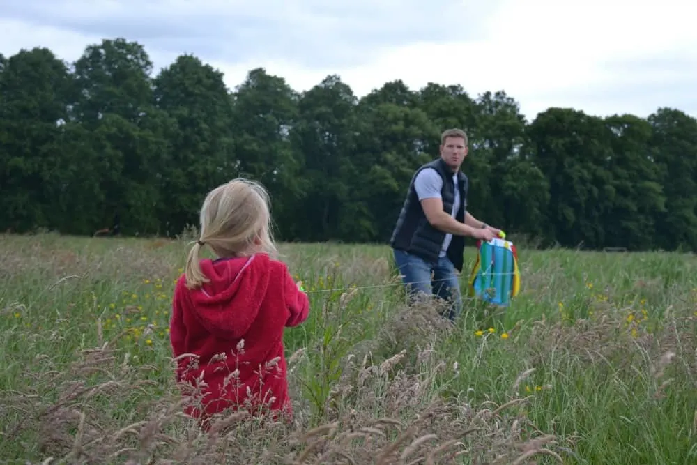 Mr Tin box launching a kit in field at Hardwick Hall National Trust Derbyshire