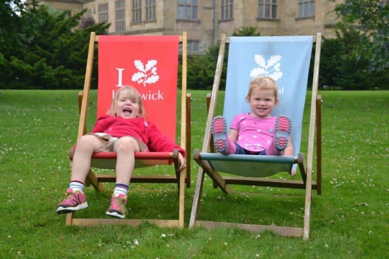 Tin Box girls on deck chairs at Hardwick Hall National Trust Derbyshire