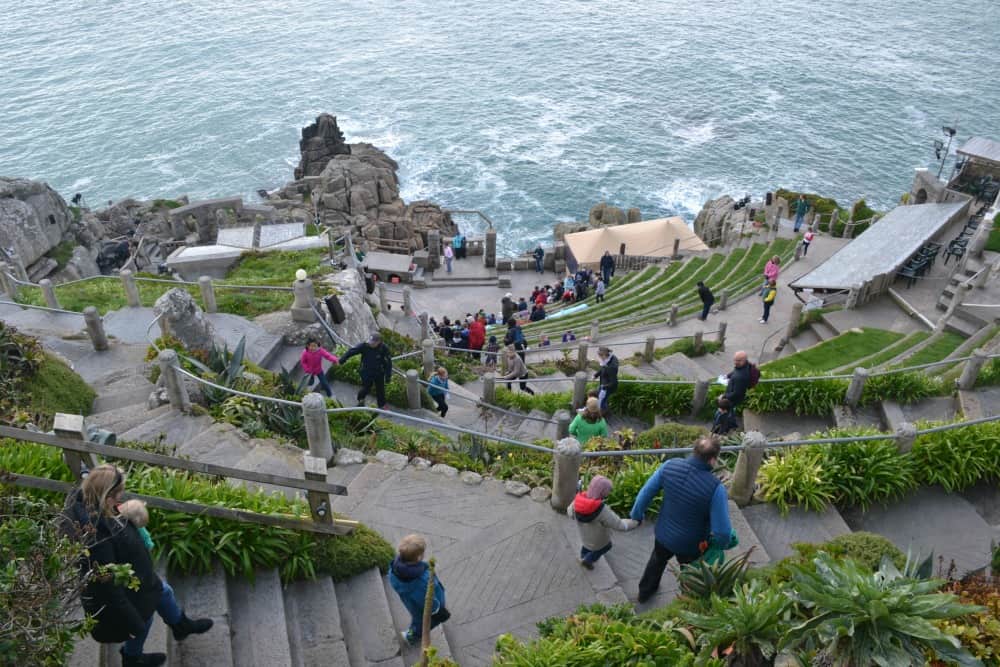 View down Minack Theatre - Open air theatre with children in Cornwall