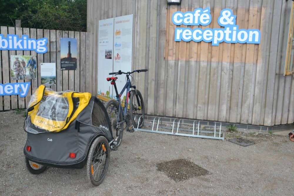 Bike and trailer at Tamar Trails Centre reception- Devon family cycle routes: Tamar Trails with kids