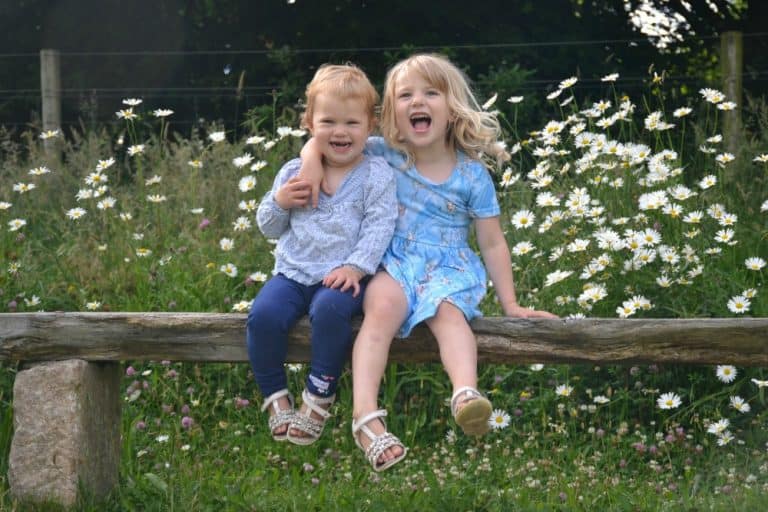 Tin Box girls in lower meadow at Woodovis Park - campsite near Tavistock, Devon