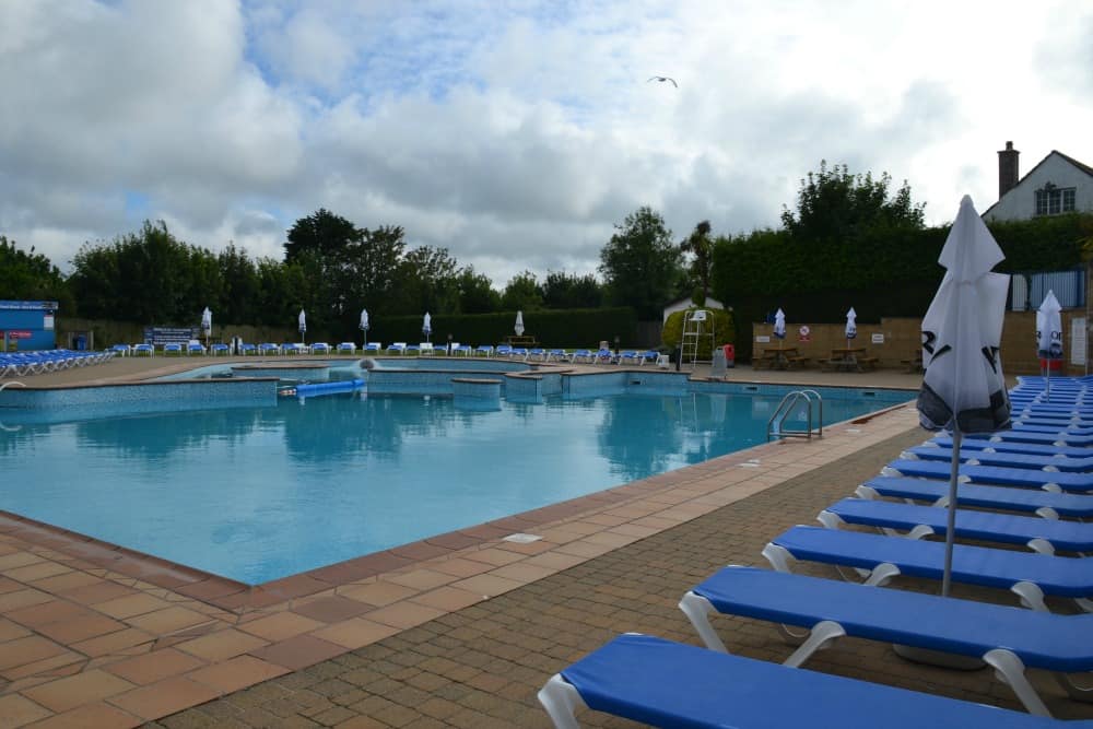 Outdoor swimming pool at Hendra Holiday Park