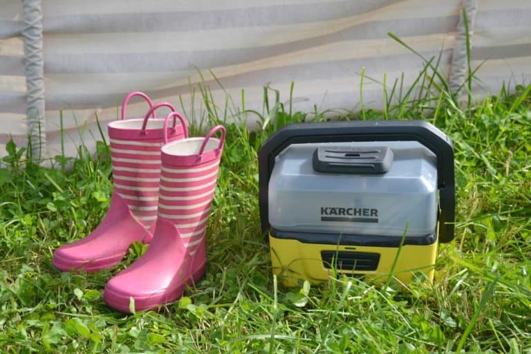 Kärcher OC3 Portable Pressure Washer and a pair of pink wellington boots