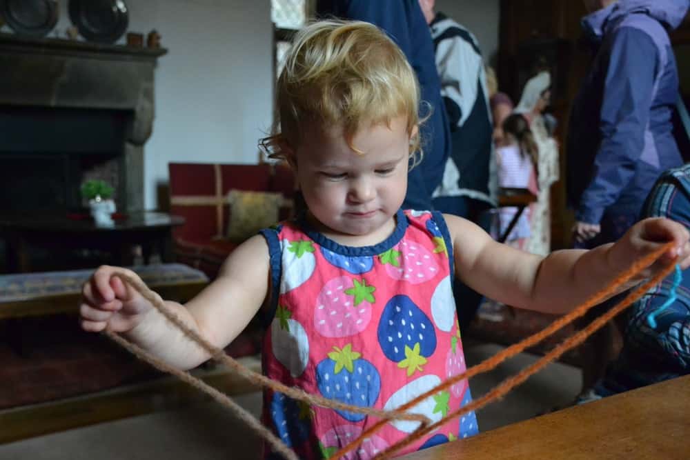 Tin Box Tot weaving at Compton Castle Tudor Days