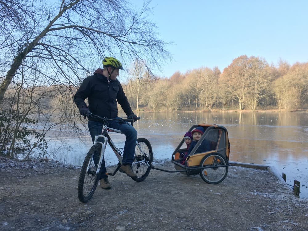 Tin Box family using bike trailer - cycling with toddlers