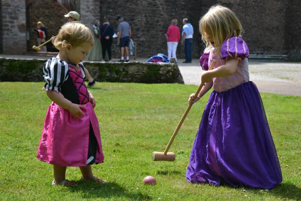 Tin Box girls playing croquet at Compton Castle Tudor Days