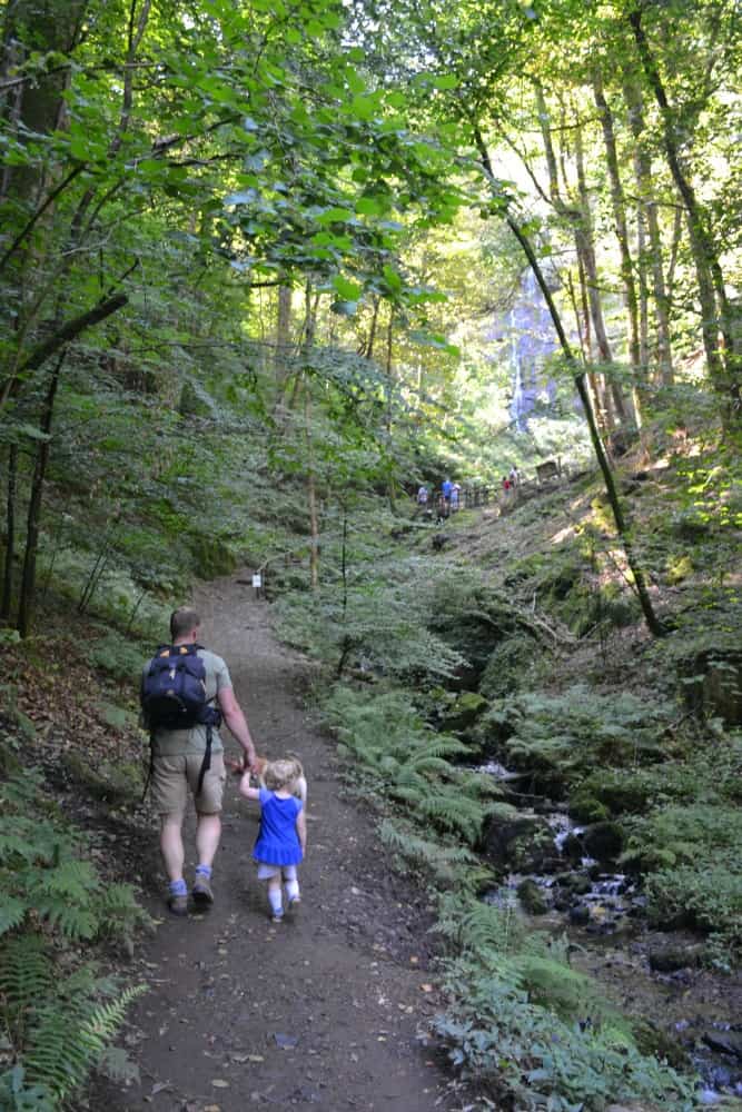Mr Tin Box and Baby walking at Canonteign Falls - England's highest manmade waterfall
