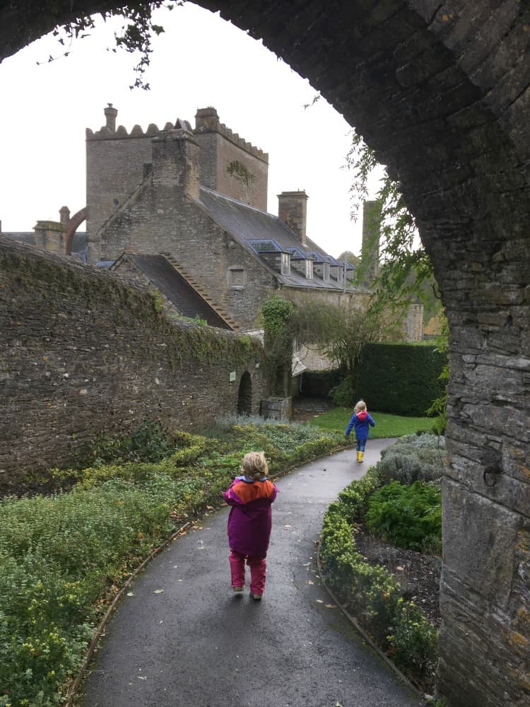 Baby and Tot running towards Buckland Abbey - Buckland Abbey with kids
