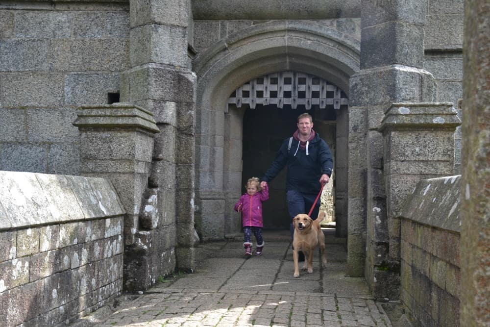 Family walking across bridge - Pendennis Castle with kids