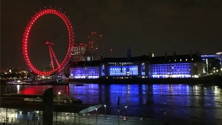 London eye lit up at night - best London views