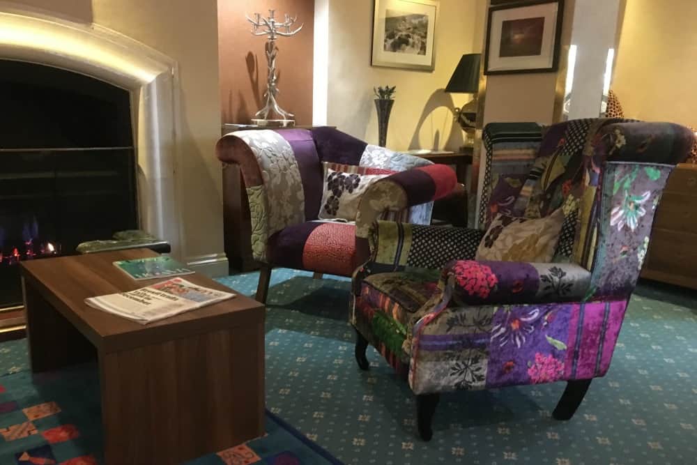 Patchwork chairs in lounge at Moorland Garden Hotel