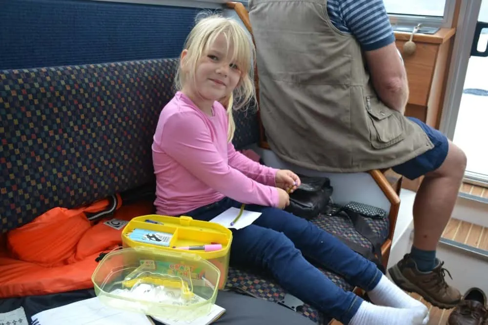 Tin Box Tot playing with craft materials - Norfolk Boards with kids