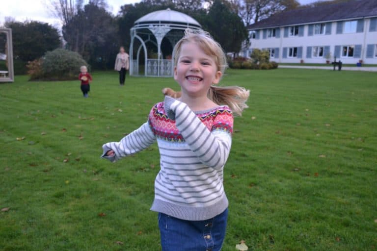Tin Box Tot running in garden at Moorland Garden Hotel