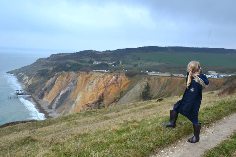 Tot looking at Alum Bay - Isle of Wight with kids