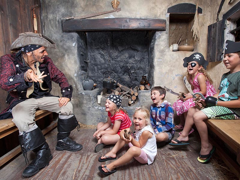 Children enjoy some swashbuckling storytelling at Pirates Quest Newquay Cornwall - things to do on a rainy day in Cornwall