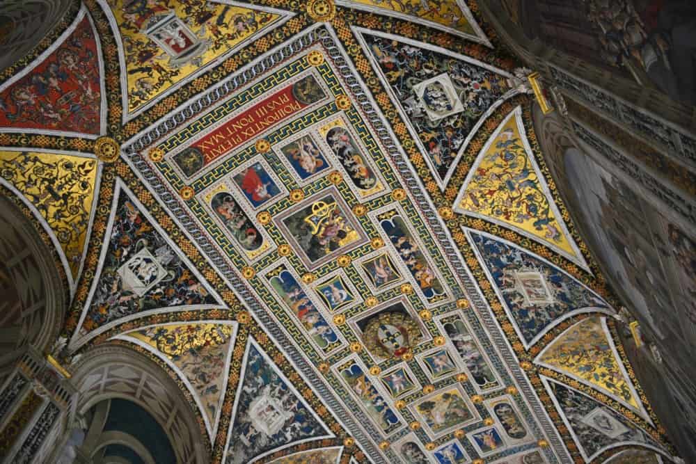 Piccolomini Library ceiling inside the Duomo, Siena Italy with kids