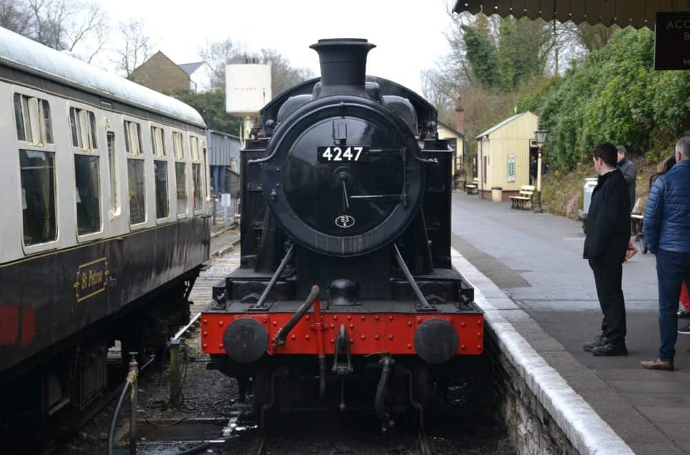 Steam train on Bodmin General station at Bodmin & Wenford Railway