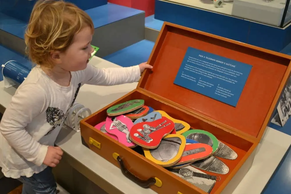 Tin Box Baby and game in The Telegraph Museum Porthcurno Cornwall