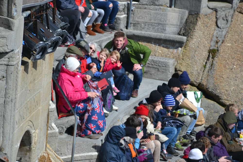 Tin Box family on terraced seating - The Railway Children at The Minack Theatre in Cornwall