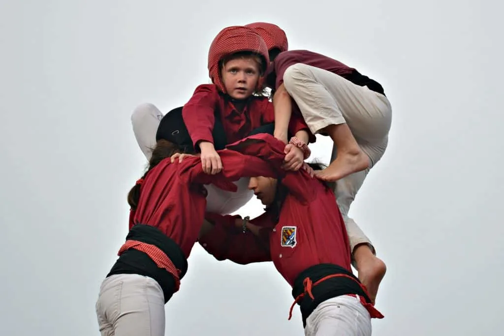 Children at the top of a Castell human tour - Costa Barcelona with kids